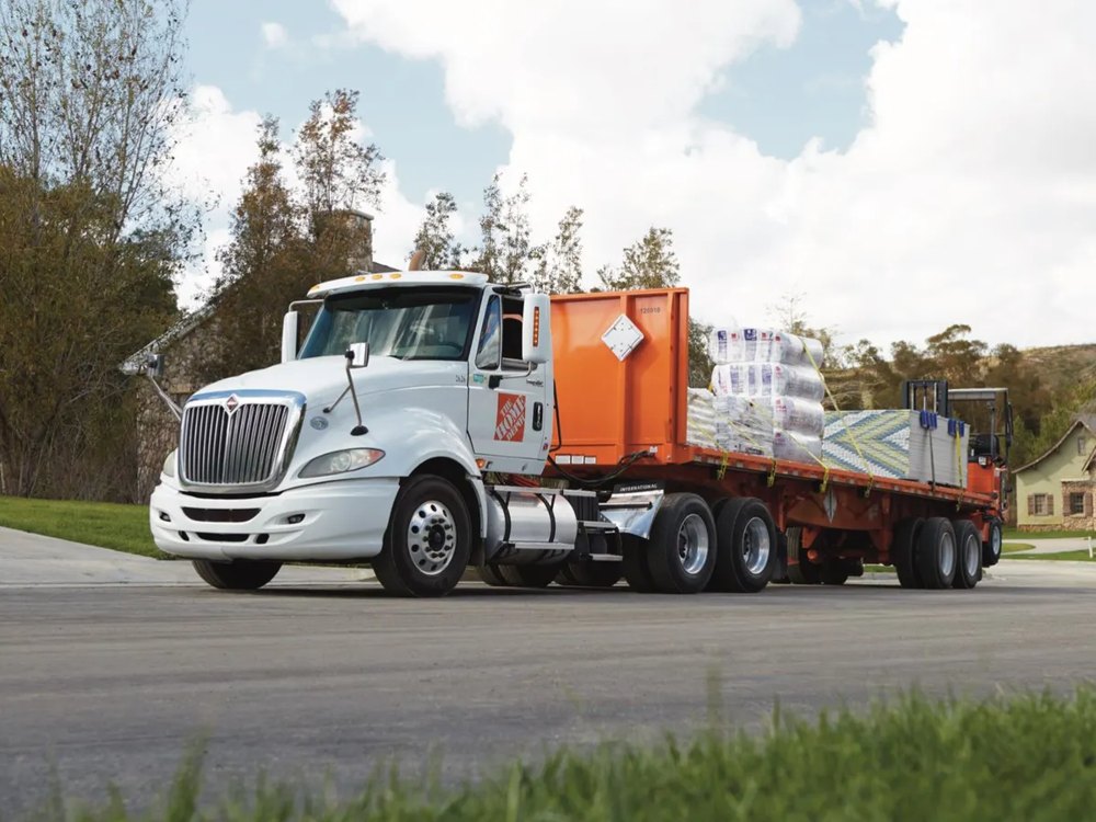 Home Depot flatbed delivery truck loaded with building materials